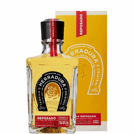 Bottle of Herradura Reposado tequila with case